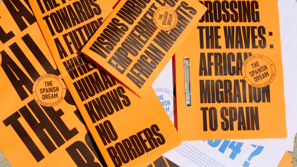 Colección de materiales impresos de color naranja con tipografía negra para el proyecto 'The Spanish Dream', enfocados en la migración africana.