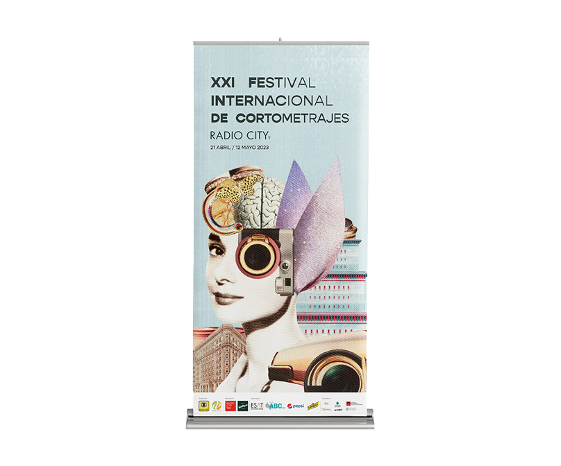 Roll-up publicitario para el XXI Festival Internacional de Cortometrajes Radio City, presentando un diseño de collage surrealista con el rostro de una mujer, una c